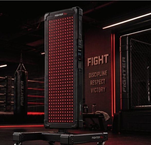 ZenGlow FIGHTER Pro – Combat Gym Recovery Panel (Coming Soon) 1 ZenGlow FIGHTER Pro red and blue light recovery panel on a braked mobile base in a combat gym